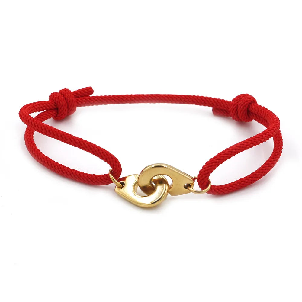 Golden Handcuffs Red Rope