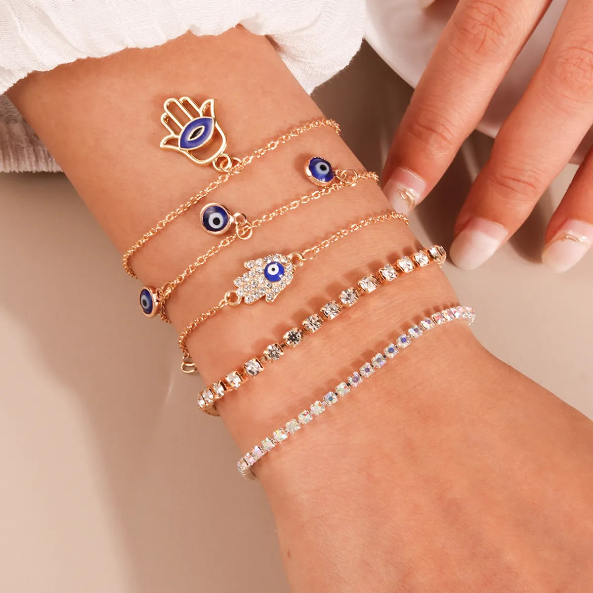 mixed metal bracelets for women-Casual Modern Style Devil'S Eye Palm Zinc Alloy Enamel Hollow Out Inlay Rhinestones Women'S Bracelets